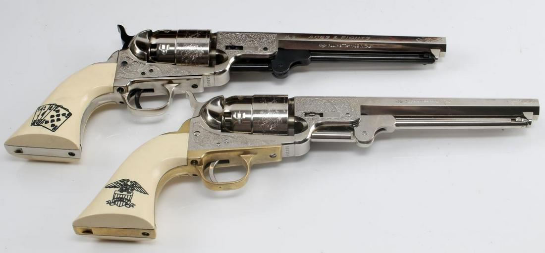 LOT OF 2 PIETTA WILD BILL HICKOK 44 CAL PISTOLS: Lot of two Italian Pietta .44 caliber 6 shot black powder percussion cap revolvers with naval engagement cylinders, ornate frame engravings, and "Wild Bill" Hickok engravings. Both barrel lengths are 