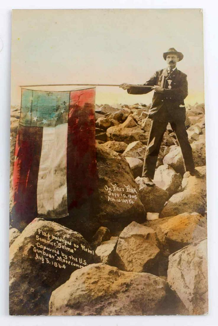 RARE CONFEDERATE GAR GUNBOAT FLAG POSTCARD: Depiction a Reunion soldier wearing a GAR medal displaying the captured Confederate gun boat Selma flag on Pikes peak. Probably one of a kind.