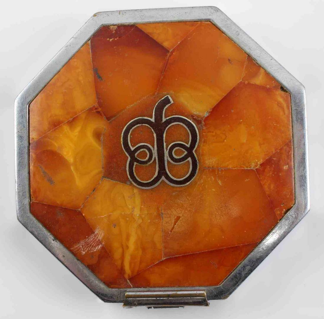 WWII GERMAN EVA BRAUN COMPACT OCTAGON POWDER CASE: WWII German Eva Braun compact octagonal powder case. Case measures 3 by 3 inches. There is still powder inside the case. The case has a mirror inside as well. Tortoise Shell material on the top of the