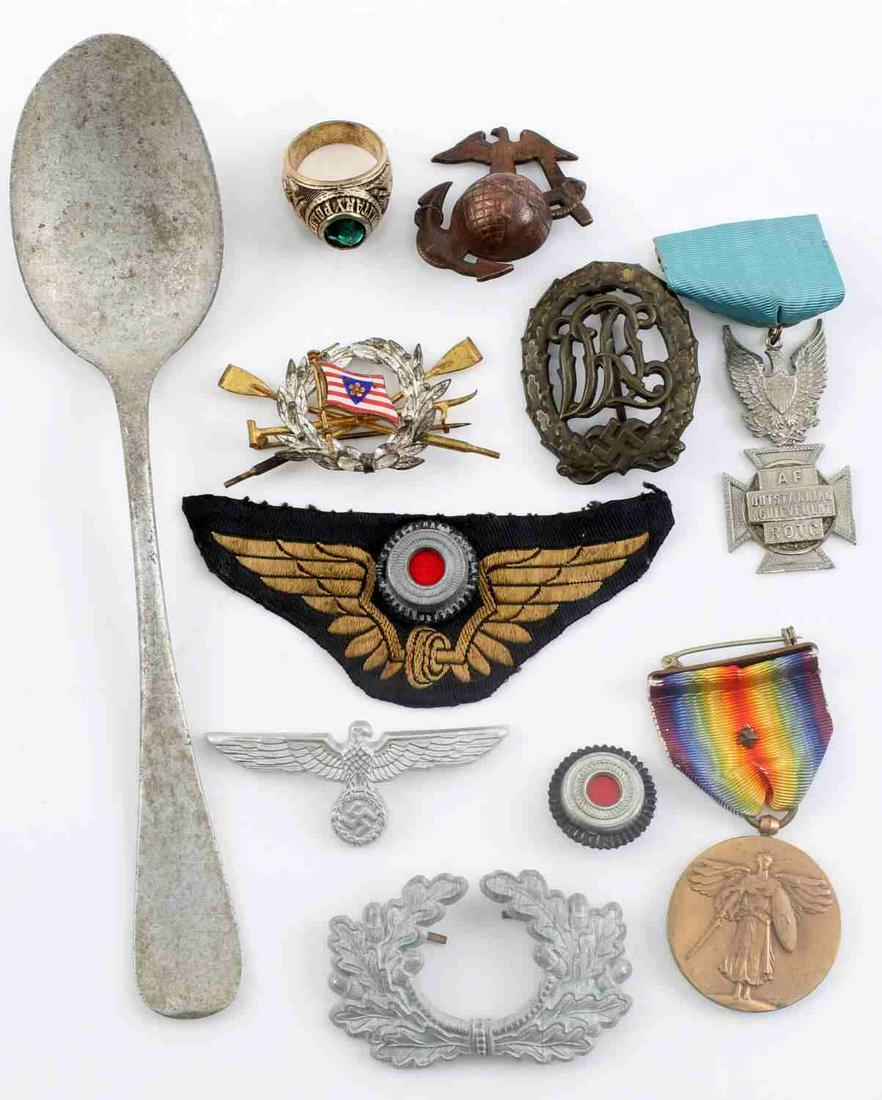 WWI US & GERMAN USMC BADGE & MEDAL LOT: Includes WWII Marine EGA cap badge, Japanese Mumm rowing club badge , third Reich DRL Sports badge, Army MP ring with damaged stone size 10. WWI medal with star, Heer eagle, Third Reich Railroad patch