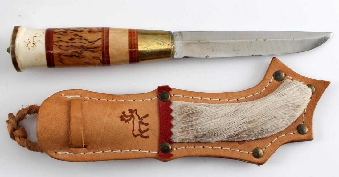 SCANDINAVIAN SCRIMSHAWED REINDEER CAMP KNIFE: Handmade traditional Scandinavian camp knife. Blade 4 inches, handle 4 1/4 inches with handmade leather sheath. In very good condition.