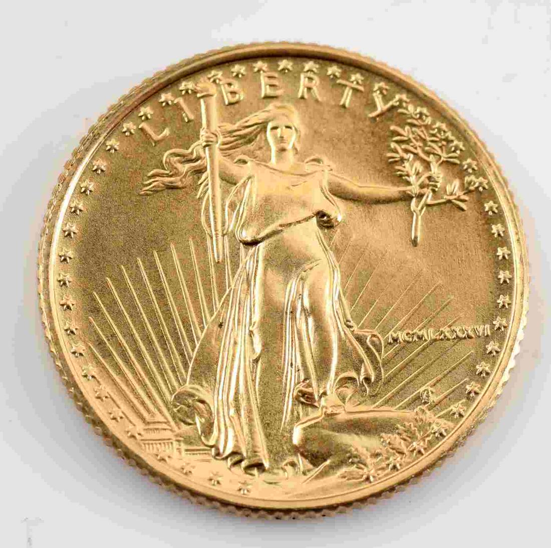 1986 1/10 OZ GOLD AMERICAN EAGLE BU COIN: 1986 brilliant uncirculated .999 fine gold coin This lot has a reserve.