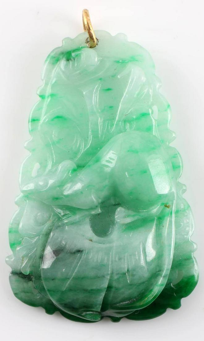 CHINESE ZODIAC RAT CARVED GREEN JADE PENDANT: Year of the Rat Chinese carved Jade pendant with 14kt gold ring bale. Total length 40mm x 28mm.