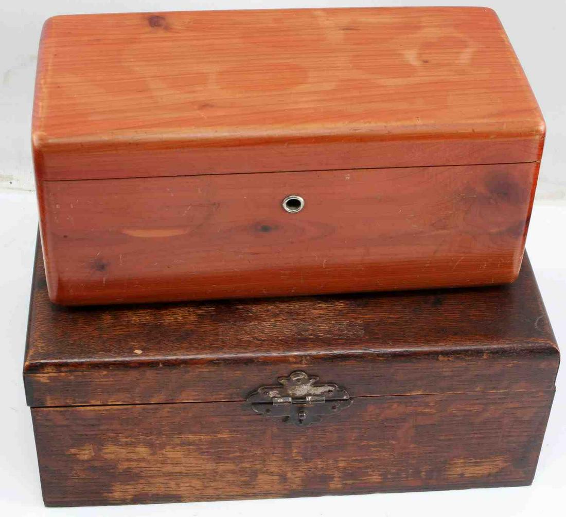 LANE CEDAR CHEST SALESMAN SAMPLE CHEST LOT OF 2: Lane Cedar Chest Salesman Sample for Wolf Furniture lot of two. Lane Cedar Chest Altavista, VA is stamped on the inside. Measures 9 by 4.5 by 3.75 inches. The other chest is a dark maple. There are no
