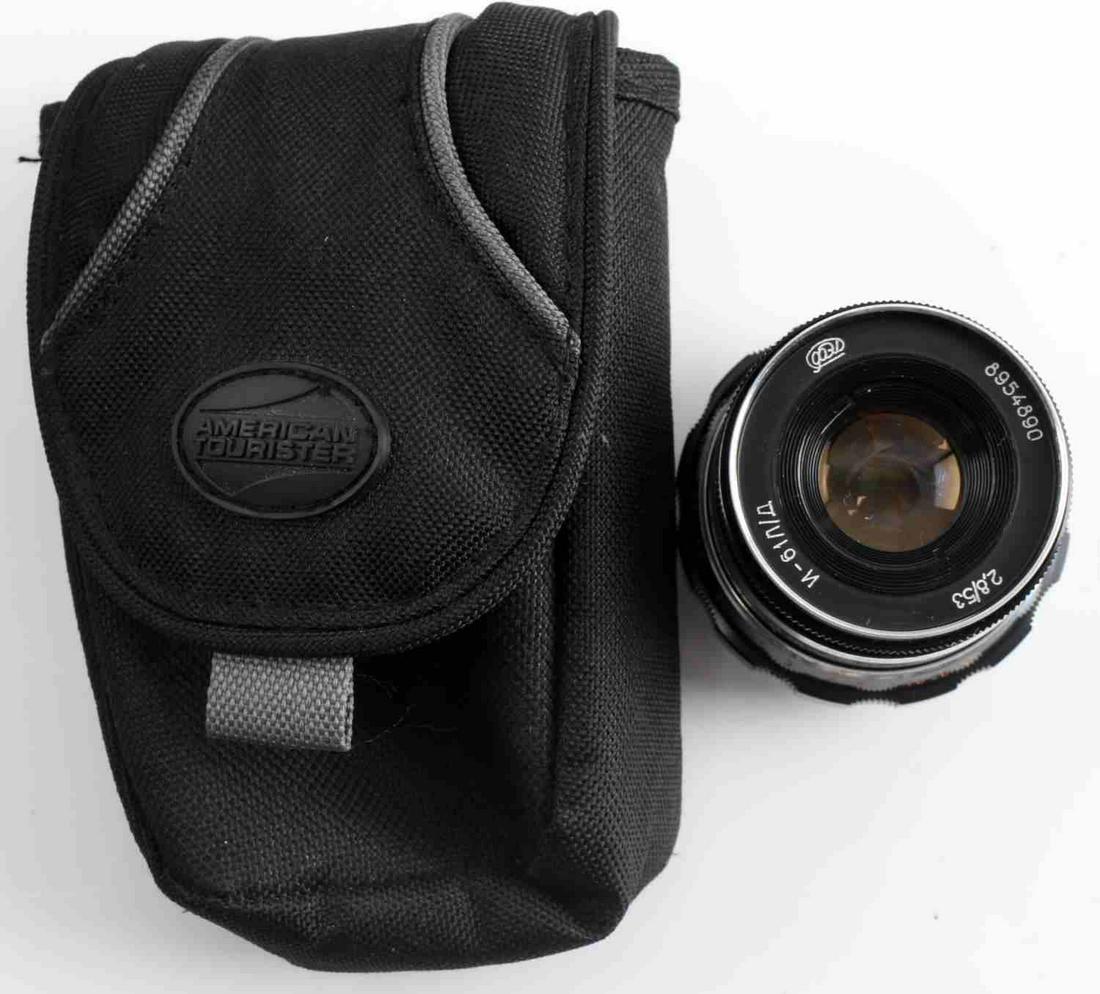 USSR SOVIET FED INDUSTAR N-61 CAMERA LENS: Soviet USSR Felix Edmundovich Dzerzhinsky Industar N-61 Camera lens in good condition. Unknown if in operating condition. Includes American Tourister carrying case. LD