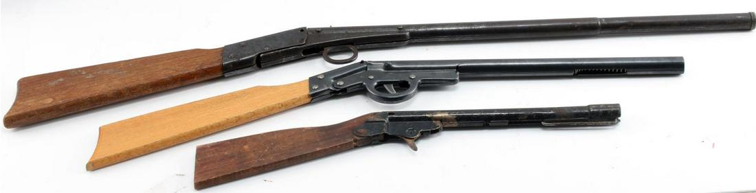 LITTLE DAISY CAP GUN AND NO 20 BB GUN LOT OF THREE: Little Daisy NO.20 BB gun and Cap Gun lot of Three. Barrel measures 16.75 inches on the Daisy BB gun and 11.5 inches on the cap gun and 8 inches on the other cap gun. One cap gun is stamped "Made in B