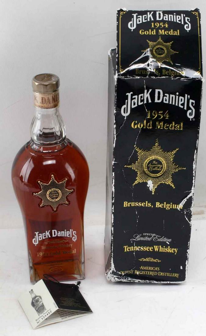 JACK DANIELS GOLD MEDAL SEALED FULL BOTTLE WHISKEY: WE CAN NEITHER SHIP OR ARRANGE SHIPPING FOR YOU, IN STORE PICK UP OR YOU MUST ARRANGE YOUR OWN SHIPPING. With box and papers, some crushing to box otherwise very good.