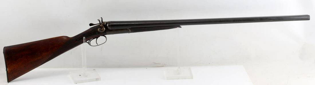 BELGIAN NATIONAL ARMS SXS PERCUSSION 12GA SHOTGUN: Brown patina, National Arms Co. marked to both lock plates, barrels measure 30 inches long, marked 'cast steel' to middle rib, bores are dark with residue and some pitting, checkered wood stocks, wood