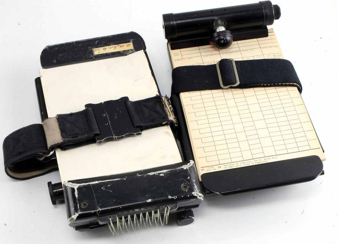 VIETNAM WAR ERA PILOTS KNEEBOARD AND CLIPBOARD LOT: Vietnam War Era Pilots MXU-163 Kneeboard and Clipboard lot of two. The clipboard function still has the original paper and pencil. Sticker of Pilot ID on the side inscribed Maj. Mitchell. Lot is in ve