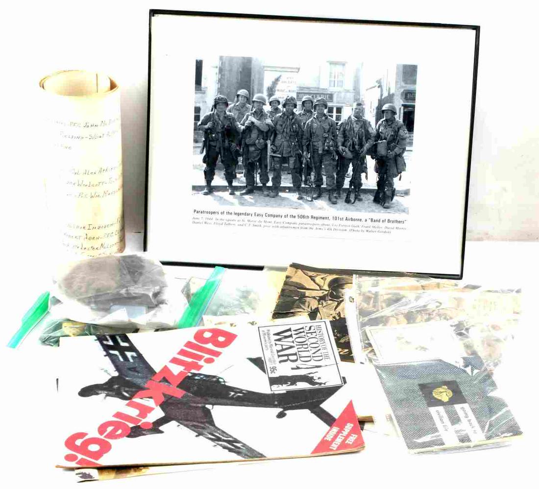 YARDLONG TROOP PHOTO BAND OF BROTHERS U BOAT: One yard long black and white U.S. troop photo reproduction from World War II, name of troops written on back, some small tears on edges, photo folded in two places, good condition. One black- framed 