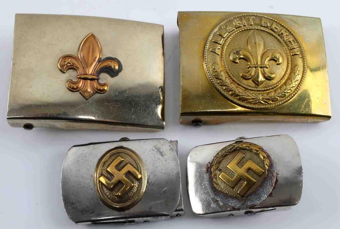 WWII GERMAN THIRD REICH HITLER YOUTH BELT BUCKLE: WWII German Third Reich Hitler Youth Belt Buckle. Lot consists of four Hitler Youth belt buckles. Two swastika belt buckles and two with a Fleur De Lis. There is some surface patina on the rear of the