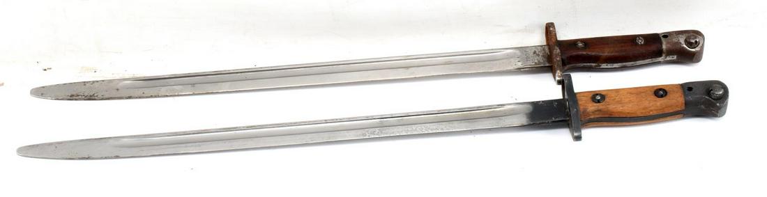 WWI BRITISH COMMONWEALTH ENFIELD BAYONET LOT OF 2: Lot includes one pattern 1907 Enfield bayonet and one Indian Enfield sword bayonet. British bayonet marked with broad arrow and "1907" on its ricasso and "DP" on its pommel. Indian bayonet with arsena