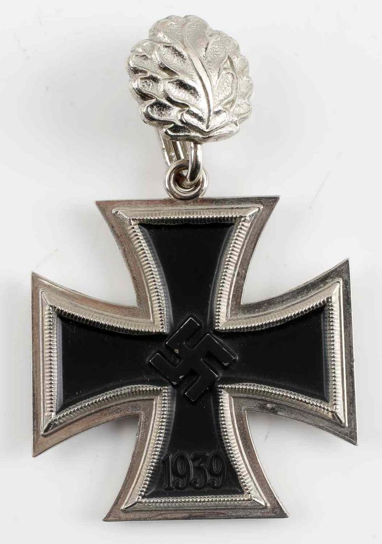 WWII GERMAN THIRD REICH KNIGHTS CROSS & OAK LEAVES: WWII German Third Reich Knights Cross and Oak Leaves. 1939 and 1813 stamped on both sides. There is no makers mark. Lot is in very good condition. Unauthenticated; sold as is. This lot has a reserve.