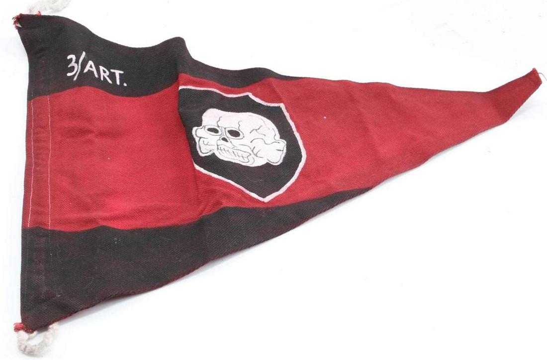 WWII GERMAN WAFFEN SS 3 ARTILLERY SKULL PENNANT: WWII German Waffen SS 3 Artillery Skull Pennant. Measures 20 1/8 inches wide by 14.5 inches tall. The front reads 3/Art and shows the Italian Waffen SS skull in the center of the pennant. Rope on one 