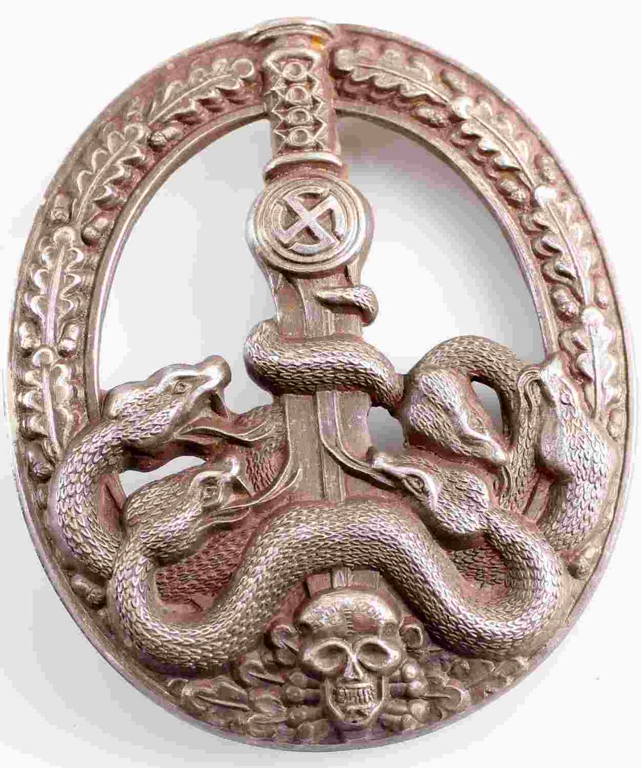 WWII GERMAN THIRD REICH ARMY ANTI PARTISAN BADGE: WWII German Third Reich Army Anti-Partisan Badge. The front showcases five cases on the lower part wrapped around a sword blade. Has a thing T style pin back. The reverse has a makers mark and the met