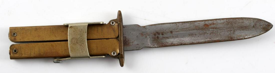 WWII GERMAN WAFFEN SS BUTTERFLY COMBAT KNIFE: German World War II Waffen SS Butterfly Combat Knife. Measures 7 13/16” inches long with the blade open. It is maker marked ‘Carl Eickhorn Solingen’, and has their squirrel logo in the center. T