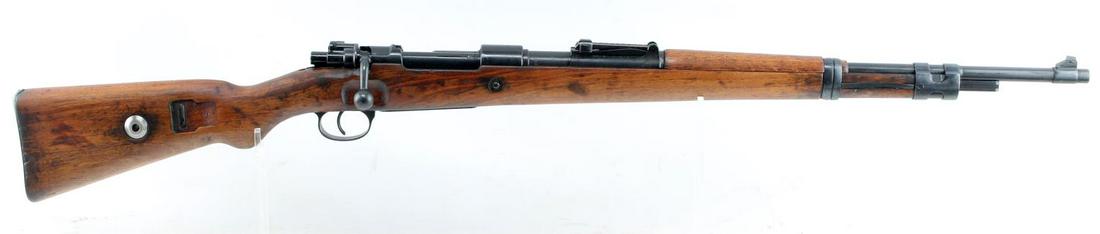 GERMAN MAUSER K98 BOLT ACTION RIFLE 8MM: Blued steel, full wood stock, fixed front and ladder rear sights, serial number and model marked to left side receiver, bcd with eagle above and upside down y mark below, number 4 below that, serial n