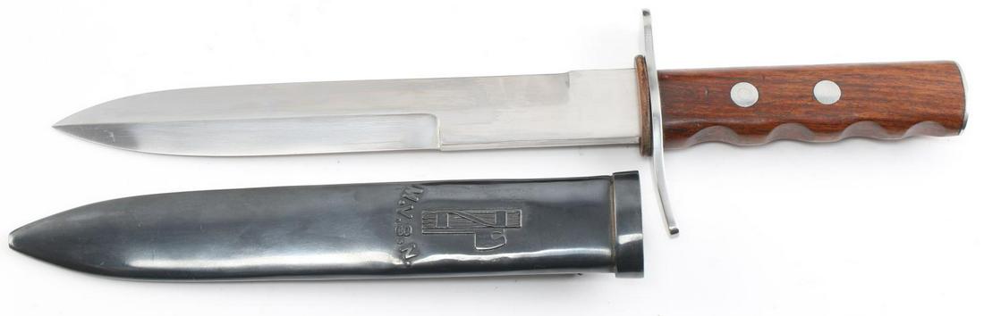 WWII ITALIAN BLACKSHIRT MVSN STEEL FIGHTING DAGGER: WWII Italian MVSN steel fighting knife with wood grip and metal scabbard in good condition with some surface wear and oxidation. Measures 13 inches long with 8.25 inch blade, 13.25 inches in scabbard.