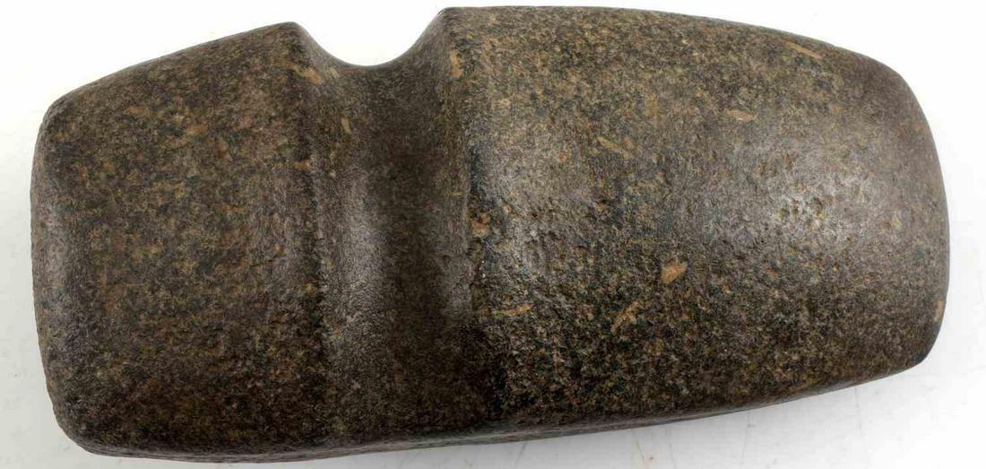 NATIVE AMERICAN LARGE GROOVED AX GRANITE: Measures 8.5 X 4 inches. Deep smooth groove at one end. Pebbled look. Good texture. Unauthenticated Sold As-Is
