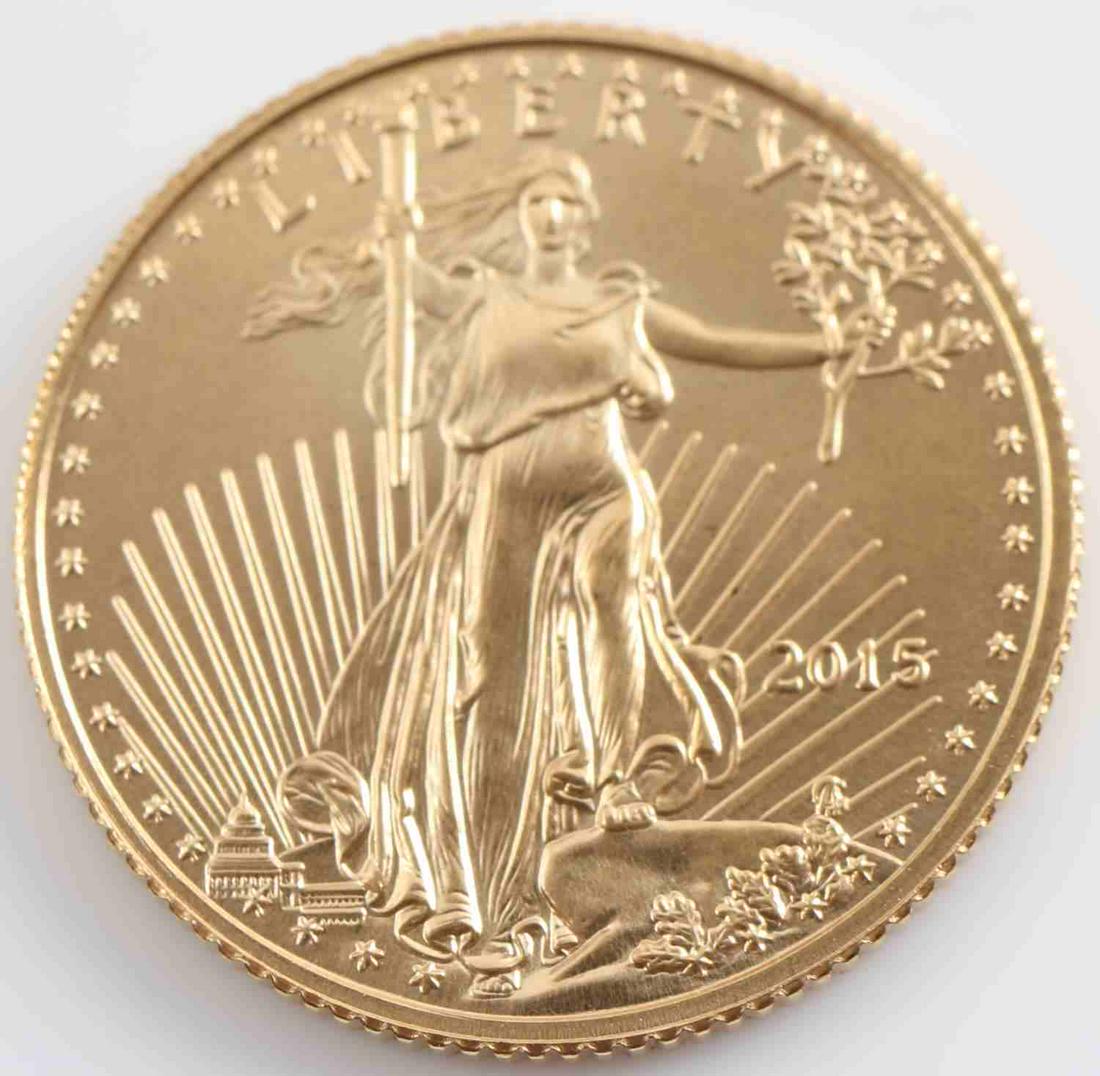2015 TENTH OZ GOLD AMERICAN EAGLE BU COIN: 2015 1/10 OZ Gold American Eagle Liberty Coin BU. Coin is composed of .9167 fine gold. Coin is in brilliant uncirculated condition.