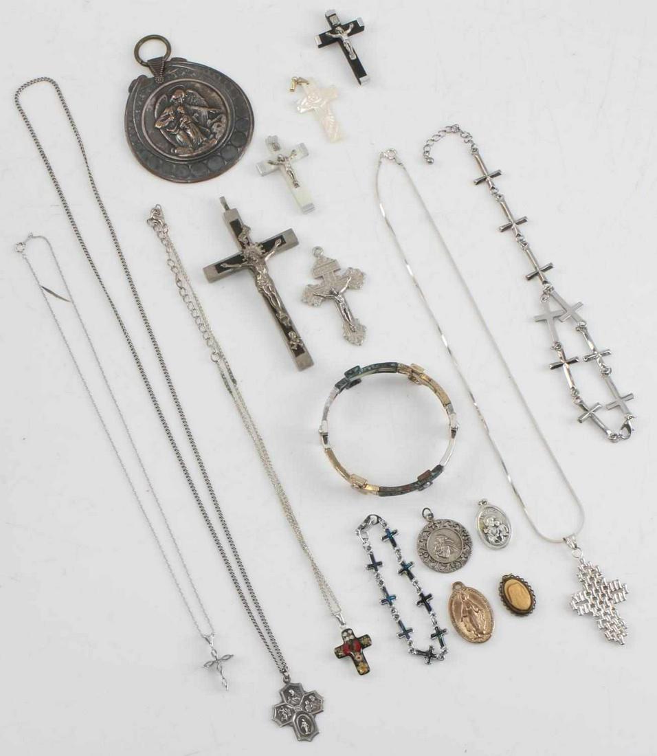CHRISTIAN CATHOLIC SAINT RELIGIOUS JEWELRY LOT: Lot includes sterling silver Catholic last rights pendant, 3 sterling cross pendants with chains( total silver weight 30grams) , multiple crucifix pendants.