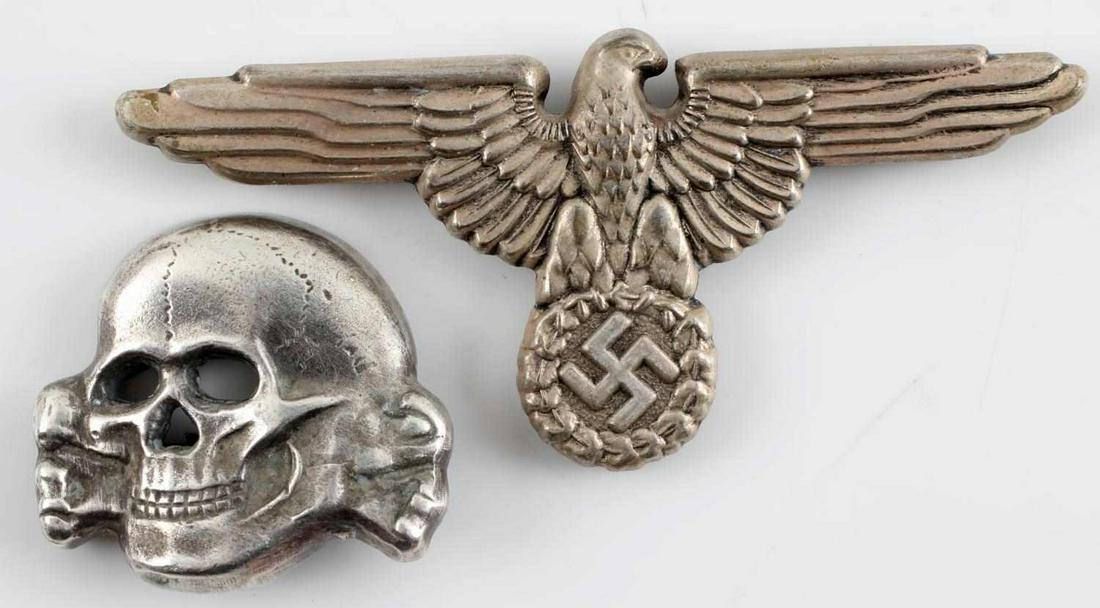 WWII GERMAN THIRD REICH VISOR EAGLE AND TOTENKOPF: WWII German Third Reich Visor Eagle and Totenkopf skull. Eagle has makers mark of M1/52 and RZM, there is finish loss and a slight patina. The totenkopf has the SS runes and a makers mark of 380/40, t