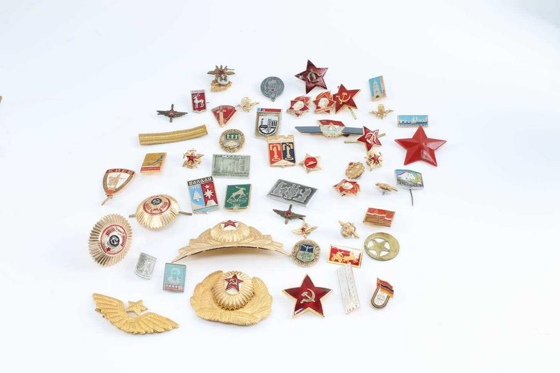 LOT OF ASSORTED USSR SOVIET ENAMELED PINS BADGES: Lot of 51 assorted USSR Soviet Lenin, Hammer and Sickle, military pins and insignias, including various hat pins and medals. Red, black, green, and blue enamel present. All in good condition with some