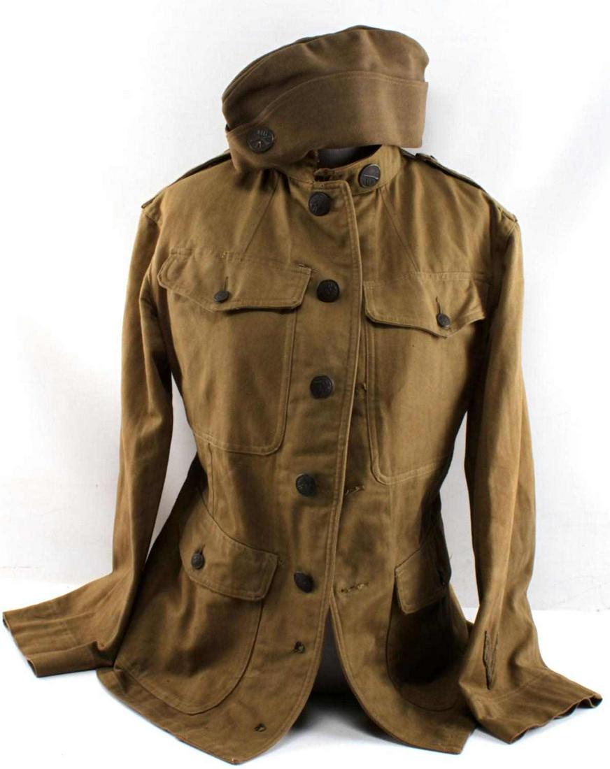WWI US ARMY MACHINE GUN CORPS TUNIC AND CAP LOT: WWI US Army Machine Gun Corps Tunic and Cap lot. The tunic has the 29th Infantry patch on the left sleeve as well as surviving PFC patch. The cap the MGA badge, the tunic is a size small. Very good co