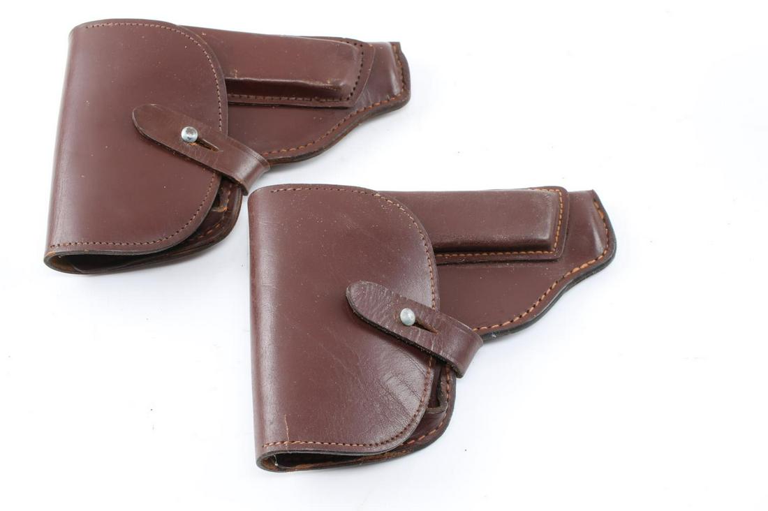 2 EAST GERMAN PP MAKAROV PISTOL HOLSTERS ARMY: Lot of 2 vintage East German leather military flap holsters for the Makarov pistol. Leather is in good condition and stitching only has minor wear marks. Will also fit the Walther PP/PPK and similar s