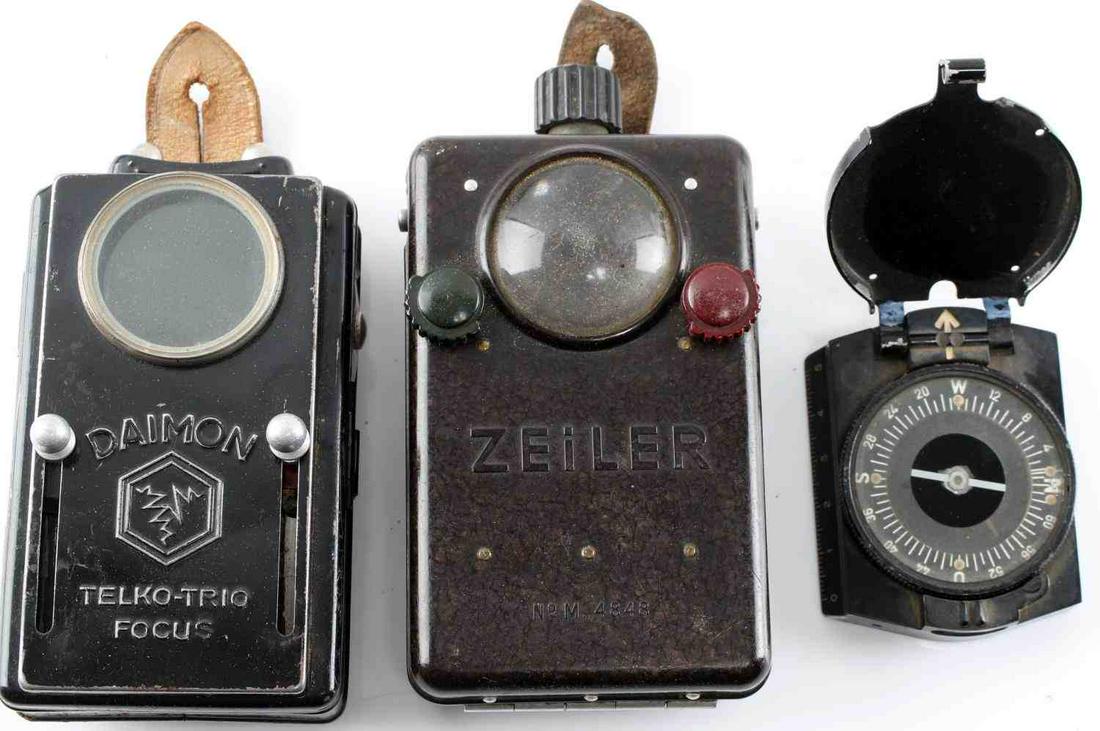WWII GERMAN THIRD REICH FLASHLIGHTS COMPASS: Lot of 2 metal flashlights from WWII Germany, from Daimon and Zeiler respectively. The Daimon flashlight measures 4 inches by 2 inches and the Zeiler flashlight measures 5 inches by 3 inches. Untested