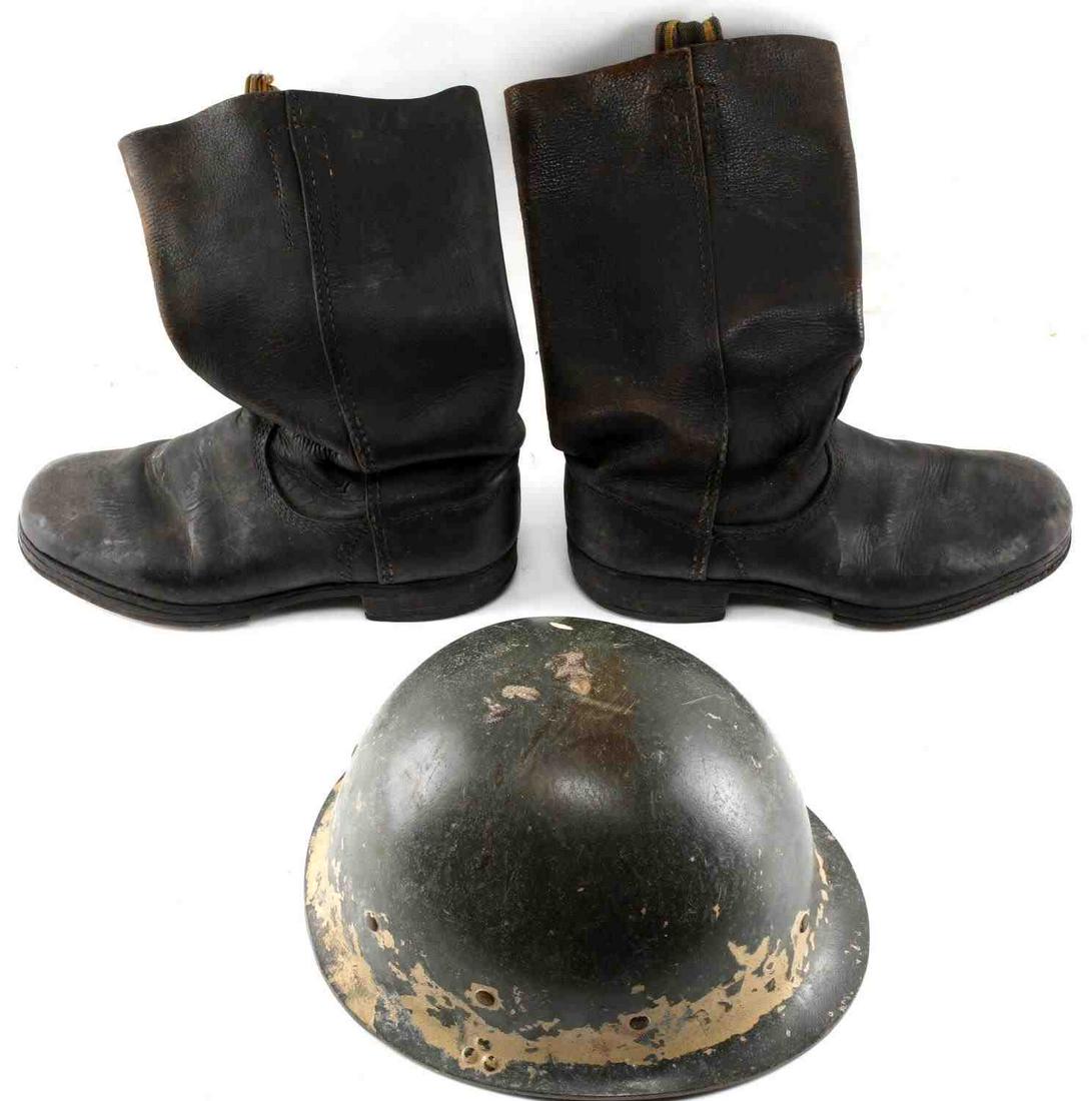 M80 IRAQI HELMET LINER AND WWII GERMAN HEER BOOTS: Bring back Iraqi helmet liner with canvas chinstrap, paint loss. German boots, about size 9, measure 11 inches long along bottom, Regenerate 167 marked to bottom, likely replaced heels. Good condition