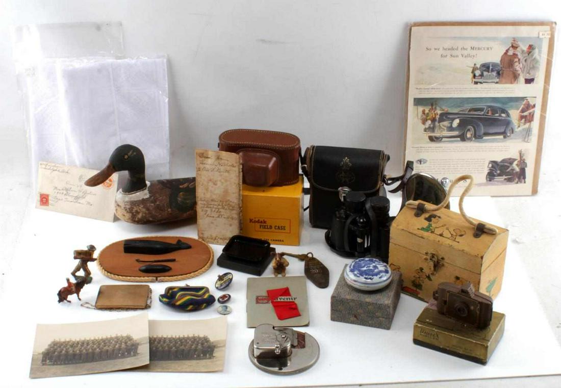 ASSORTED ANTIQUE AND VINTAGE DEALERS LOT: Lot includes Kodak Pony 135 with case, Civil War era land deeds, Military photos, Snoopy lunch box, vintage lace aprons in original wrap, 1940's Mercury Auto advertisement, duck decoy, head is not sol