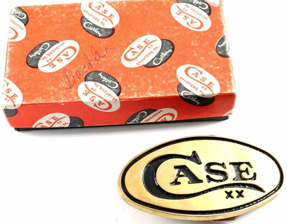 VINTAGE CASE XX KNIFE BRASS BELT BUCKLE NEW IN BOX: Vintage Case Knife brass belt buckle new in original box with included pamphlet. Measures 3.4 inches wide by 1.75 inches tall. Box measures 2.75 inches wide by 4.75 inches tall.