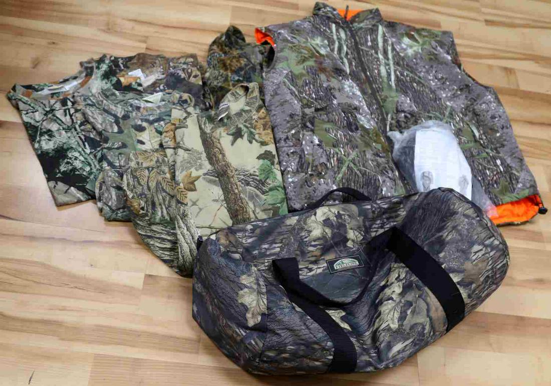 CABELLAS OUTFITTERS CLOTHING LOT W TREE HARNESS: Tree harness new in bag with instructions. Clothing all size 2 XL in lightly used to new condition brands include Cabellas and Outfitters ridge. Quilted vest new without tags. Lot includes duffle bag.