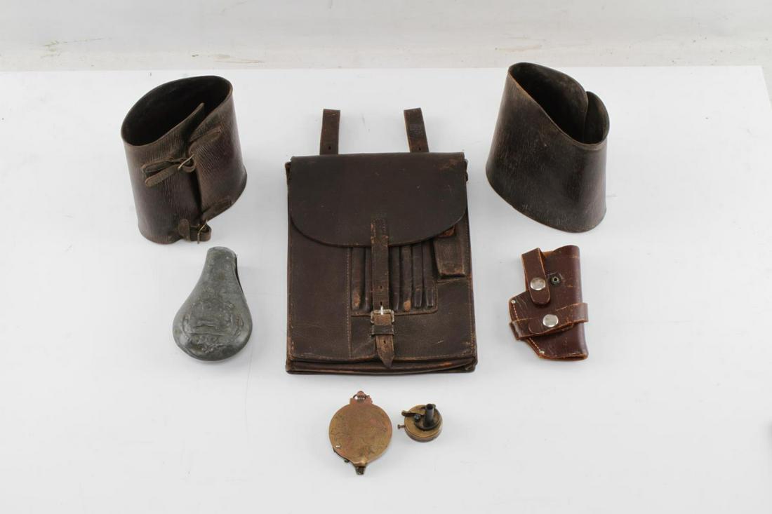 VINTAGE LEATHER BOOT BELLS SATCHEL POWDER FLASK: Lot includes vintage pair equestrian bell boots with leather and brass buckle construction, each 6 inches at longest point. Second item is a leather satchel with built in pencil case, marked "1939" (1