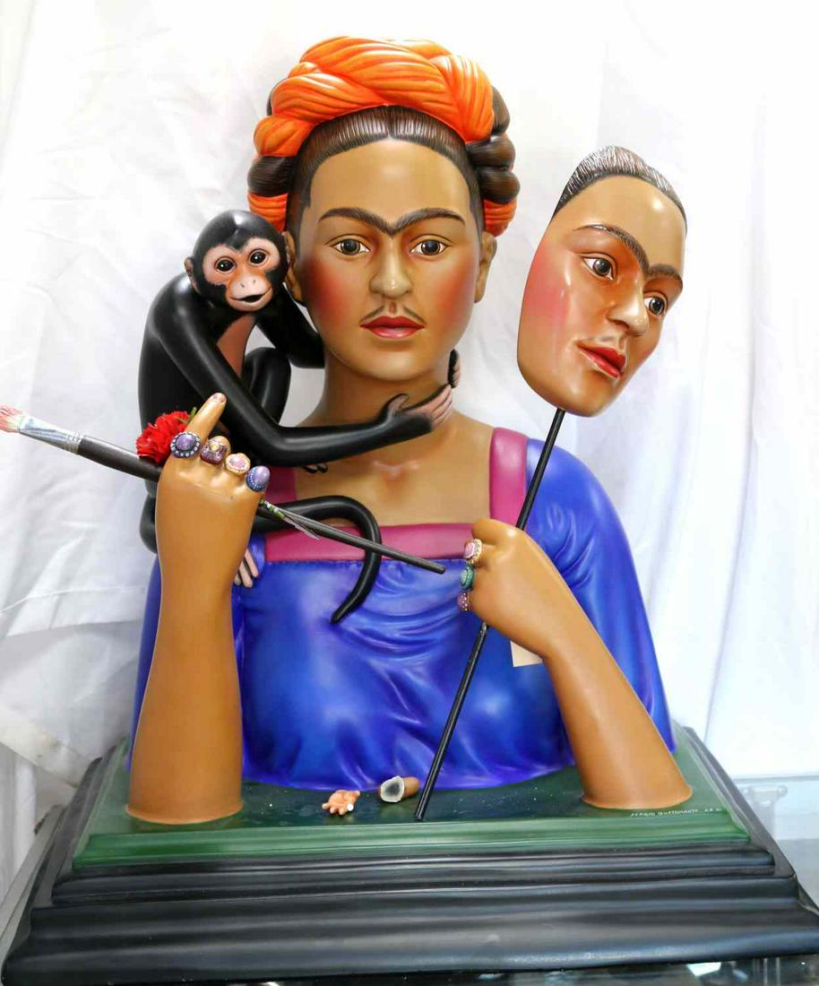 SERGIO BUSTAMANTE FRIDA KAHLO CERAMIC SCULPTURE: Sergio Bustamante (b.1942 Mexican) ''Frida Kahlo'' Ceramic Sculpture 24 inches by 21.5 inches by 16.5 inches. Artist Proof edition signed at base. Small break to pinky finger. One other finger has bro