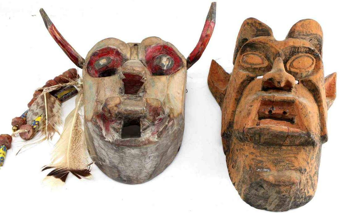 MEXICAN CARVED WOOD DIABLO DEVIL DANCE MASK LOT: Antique Polychromed wood mask is 10 inches from horn to horn and 9 inches in length with rough cut jasper disk and trade beads. The second wood devil mask measures 13 by 9 inches and appears to have h