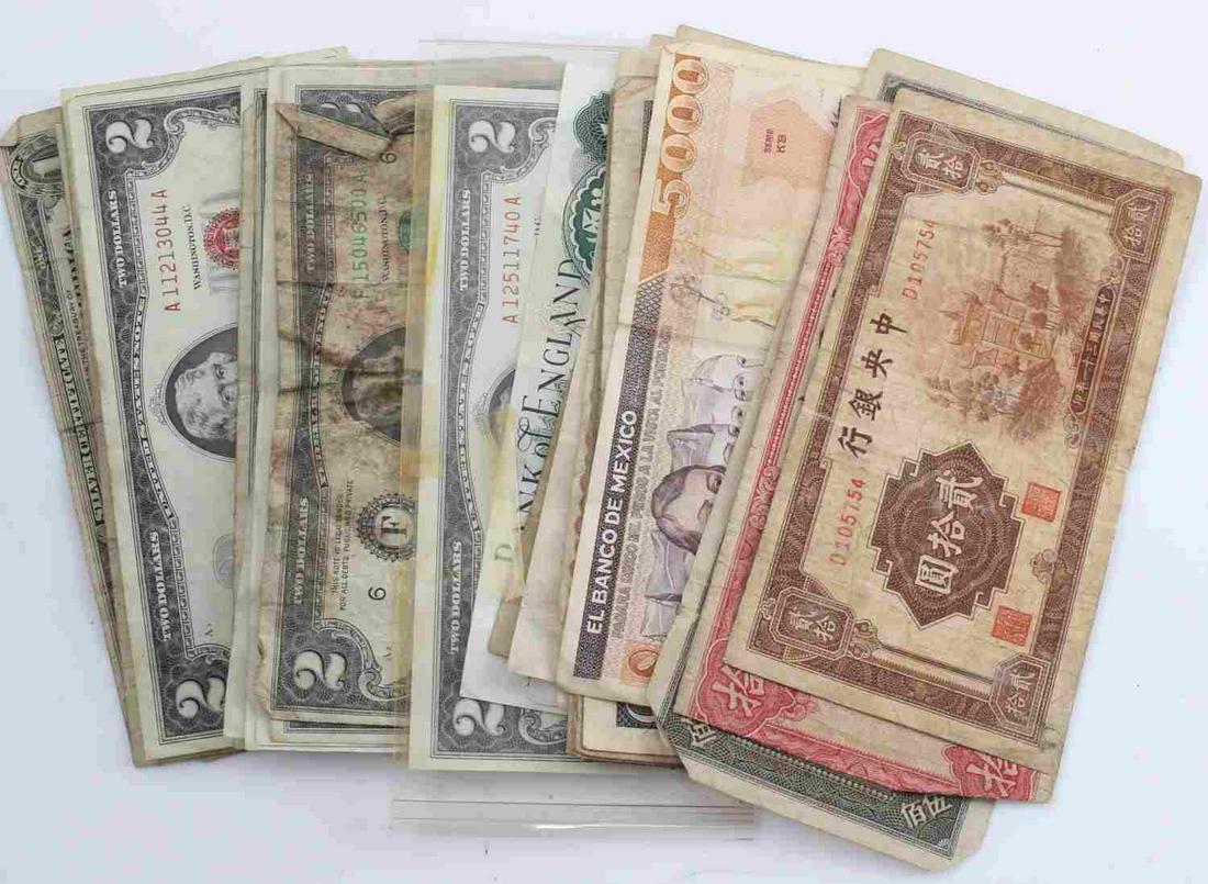 35 PIECES OF WORLD BANKNOTE CURRENCY LOT: Three US silver certificates, fourteen 2 dollar US bills, two Bank of England 1 pound notes, two 5 El Salvador colones, one Honduras 5 lempiras note, one Mexican 1 peso note, one 10 peso note, and one