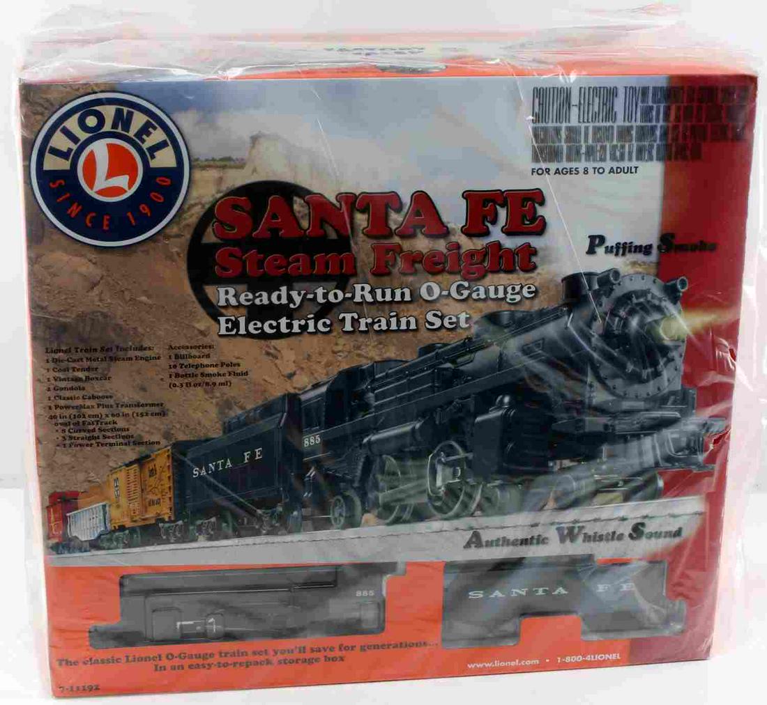 LIONEL TRAINS SANTA FE STEAM FREIGHT ENGINE: Lionel Trains Santa Fe Steam Freight Engine Electric Train. The train has an authentic whistle sound. The train set includes one steam engine, one coal tender, one vintage boxcar, one one gondola and