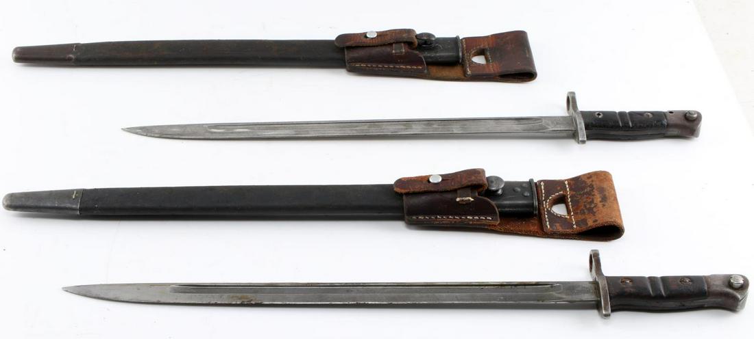 2 WWI US MILITARY M1917 BAYONET FROG & SCABBARD: Lot of 2 WWI United States Military M1917 bayonets with frogs & scabbards. Both have "1917", "26" on one, "31" on the other, "Remington", "US", eagle, and Flaming Shell stamped on ricasso. Both measur