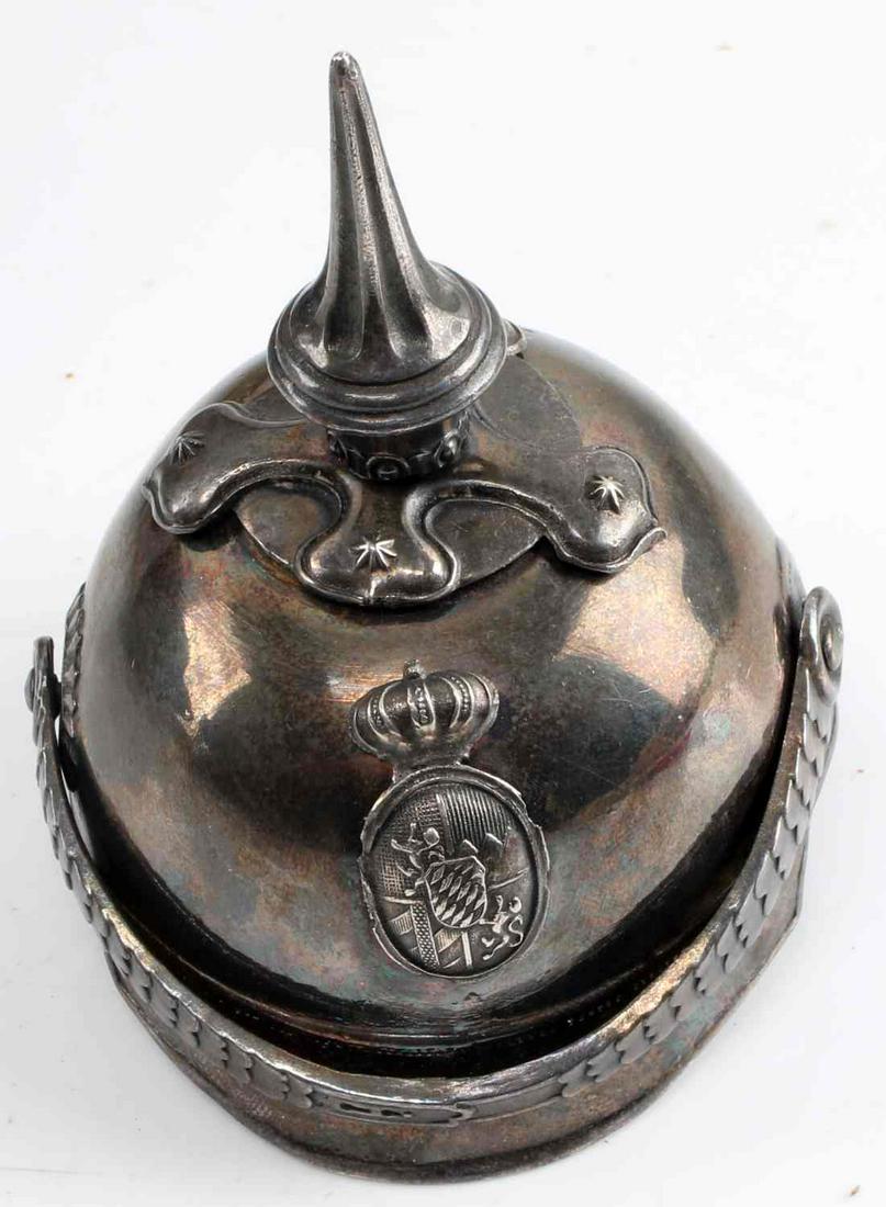 WWII SILVER MINI IMPERIAL GERMAN PRUSS PICKELHAUBE: One silver (tested for silver as well) mini-helmet with pickelhaube and coat of arms decoration from WWI Germany measuring 4 inches by 3.5 inches. Pickelhaube is removable by nut located on top inside