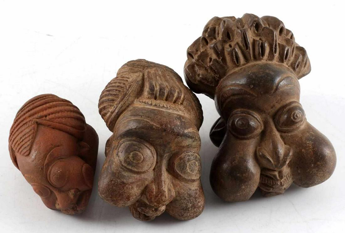 LOT OF 3 CAMEROON AFRICAN BAMUN POTTERY PIPE BOWLS: Hand carved and sculpted pipe bowls. The largest is the sturdiest, measures 4 X 3 inches with little loss at rim, the second measures 4 X 2.5 inches with little roughness at rim, and the last one is t