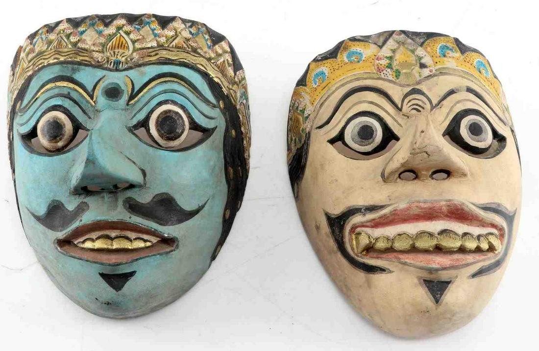 TOPENG INDONESIAN POLYCHROME THEATER DANCE MASKS: Wooden Topeng, known as the dancing mask in Indonesia. Blue mask has crack along right side. Yellow one is in great condition. Handmade and painted 8x6 inches.