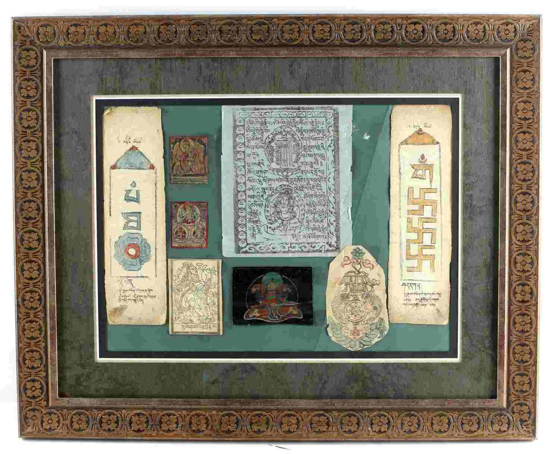 19TH CENTURY PRINTED BUDDHIST PAPER PARAPHERNALIA: 8 pieces of Buddhist paper paraphernalia. Materials look to be printed and hand colored. All mounted in frame. Measures 16.25 inches by 11.5 inches sight and 24.75 inches by 20 inches frame. This lot 
