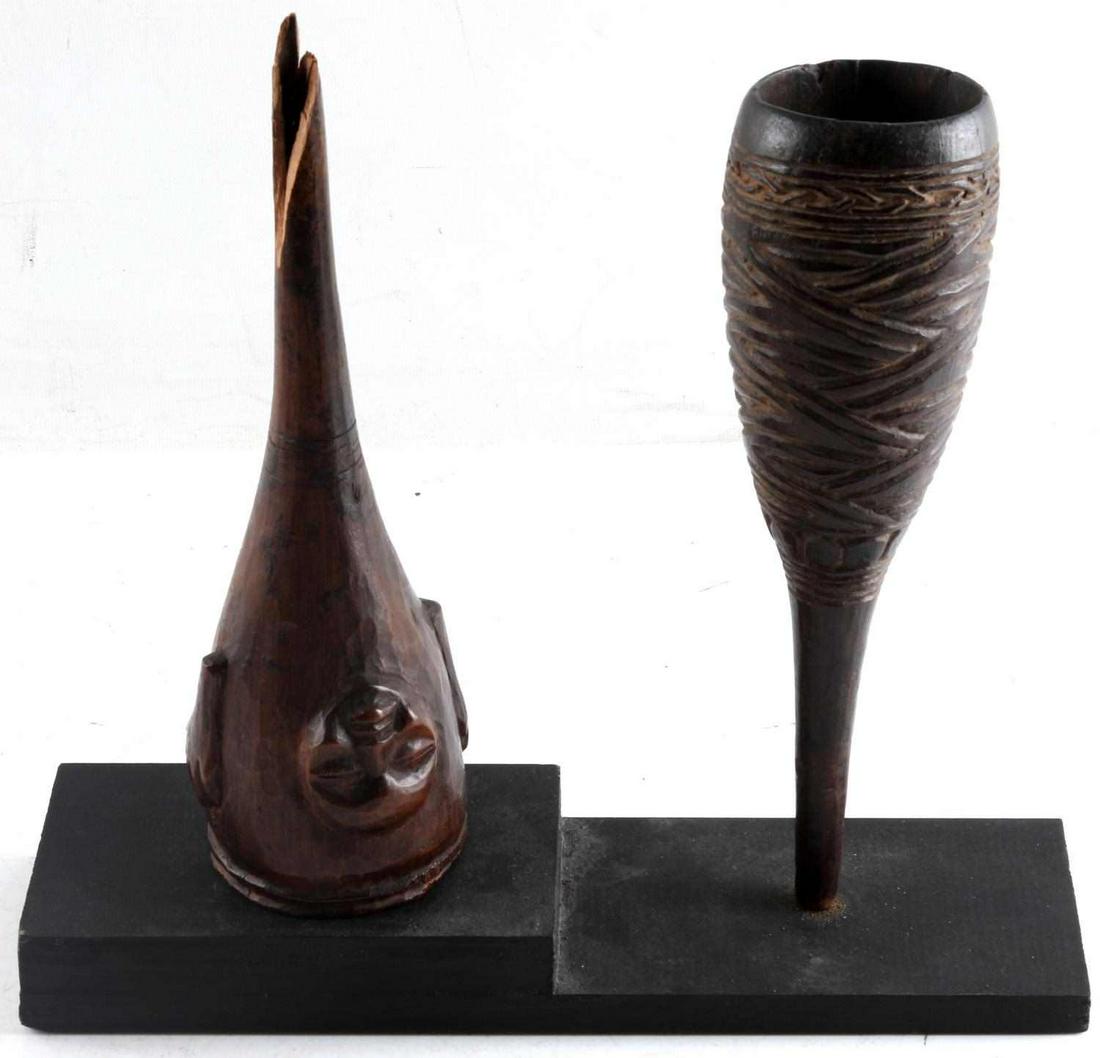 ANTIQUE AFRICAN CARVED WOOD CLYSTER ENEMA LOT OF 2: Antique African Carved Wood Clyster Enema Lot of Two. Used to administer enemas, a therapeutic procedure employed by various African ethnic groups for centuries. Groups such as the Kuba peoples made C