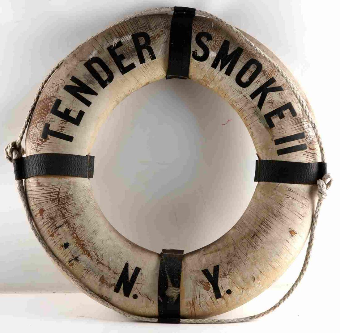 ANTIQUE TENDER SMOKE II NYC FIRE BOAT LIFE RING: Antique Tender Smoke II New York Boat Life Ring Float. The life ring measures 28 inches in diameter and has rope around the exterior. There is a nice wear on the front. The ring is from the from the S