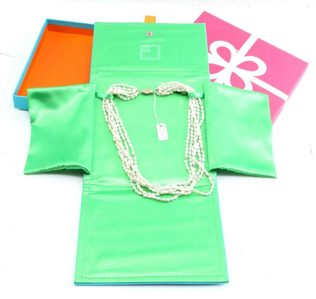 FRESH WATER PEARL & 14K YELLOW GOLD NECKLACE: JC Penny necklace has 14k gold clasp and 33 2.95 mm beads.