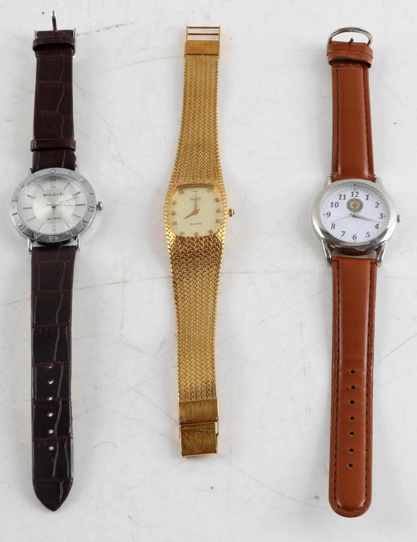 PIAGET BVLGARI AMERICAN LEGION WATCH LOT OF 3: Piaget, Bvlgari and American Legion Watch lot of three. Watches are in non-working condition. There is a crack on the bezel of the Bvlgari watch and the band is separated. The Piaget has a gold band a