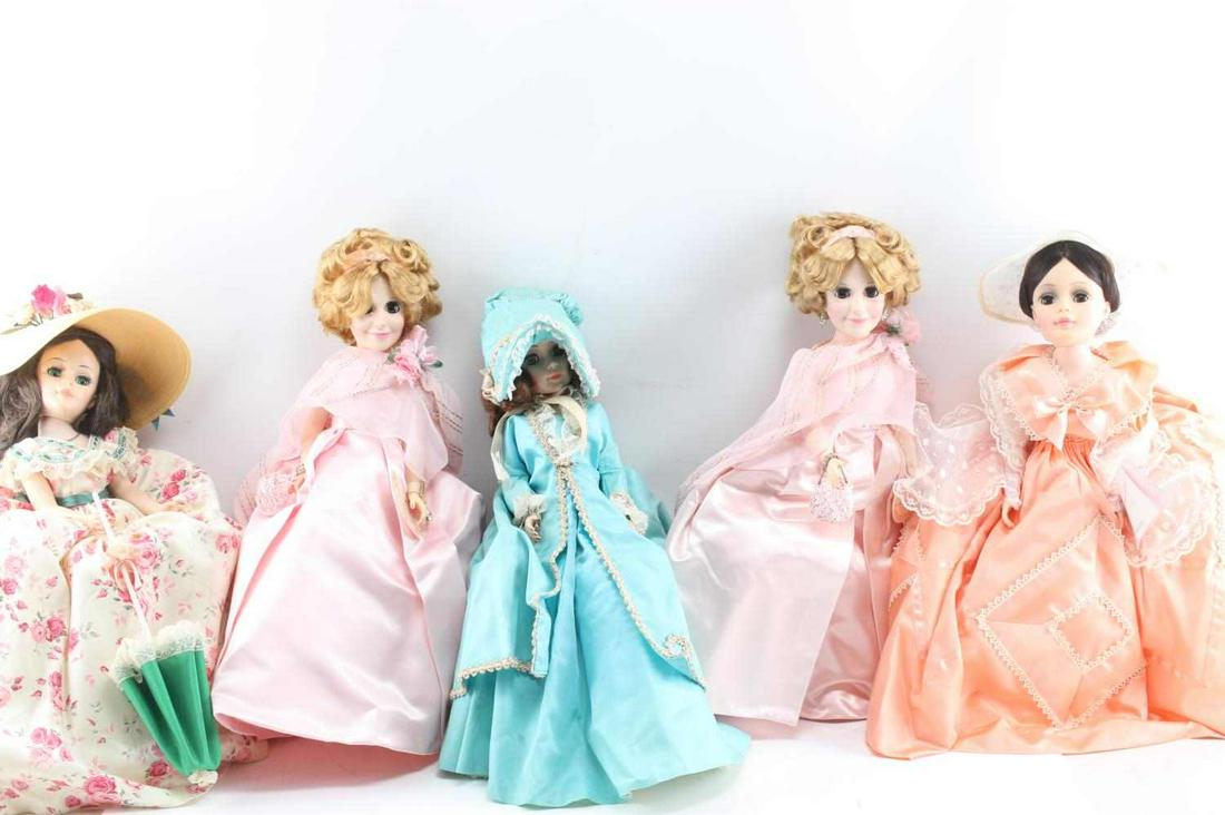LOT OF FOUR 21 INCH MADAME ALEXANDER DOLLS BOXED: Two numbered 2290 with different pink dresses. One Melanie 2254. One Scarlet 2240 wearing floral dress. One unnumbered. All in good condition.