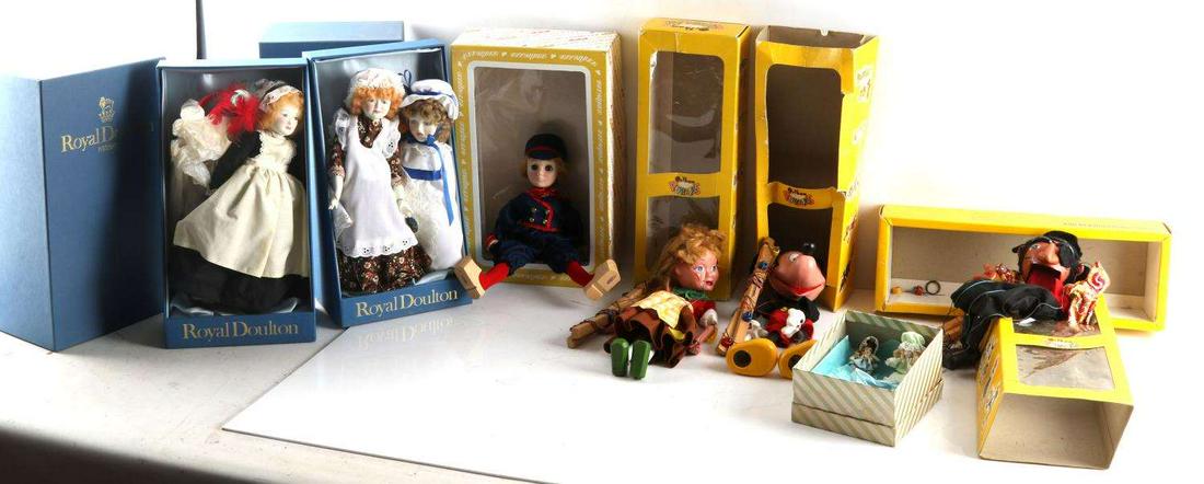 LOT OF NINE DOLLS ROYAL DOULTON EFFENBEE PELHAM: Three Royal Doulton dolls. One "Big Sister" One "Wednesday's Girl" One "Saturday's Girl" One Effanbee 1172 Hans Brinker. One Pelham Marionette Pirate. One Pelham Marionette Gretel. One Pelham Marionet